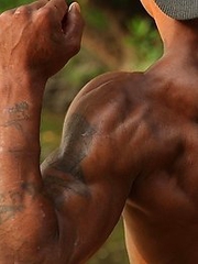 gypsy tattooed guy shows his muscles and beautiful body