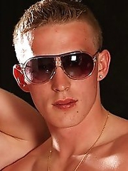 Two muscle boys showing shaved cocks